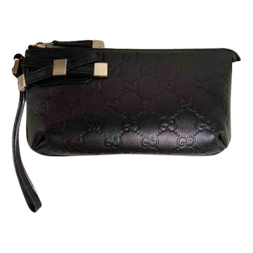 Gucci black leather clutch bag