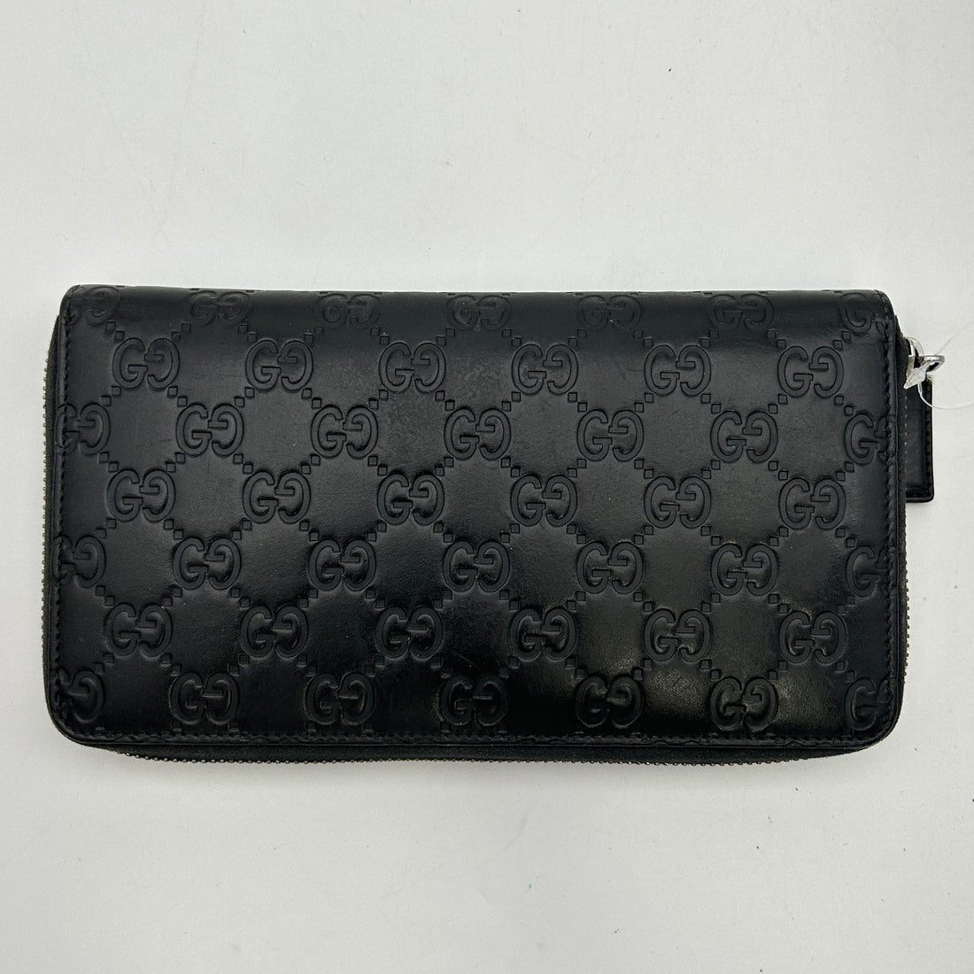 Gucci GG rubber-effect zip around wallet in black leather gu6612gd