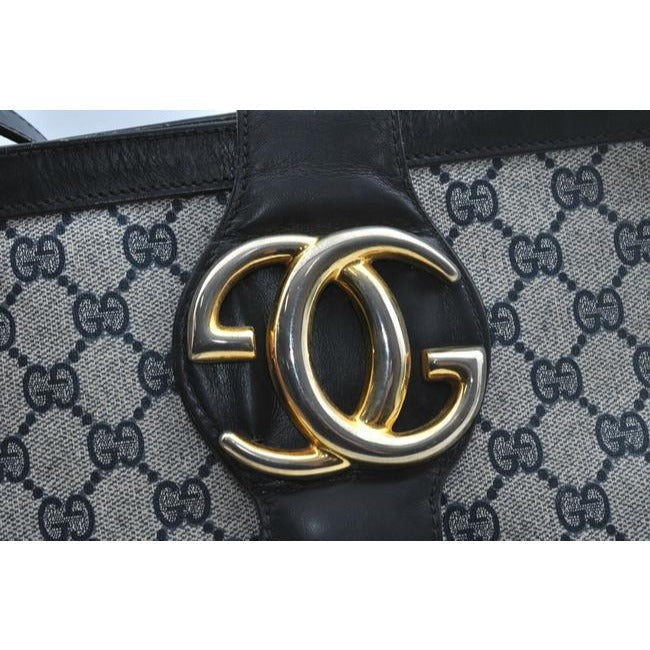 RARE,  Gucci, navy Guccissima print leather, satchel style, bucket bag with blue and red stripe