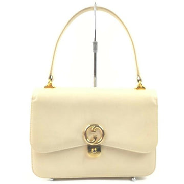 , Gucci, cream leather, 1973 top handle style purse with gold tone accents!