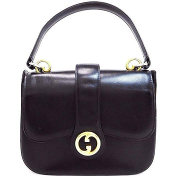 RARE,  Gucci, mod, black leather, two-way top handle style purse with gold tone accents