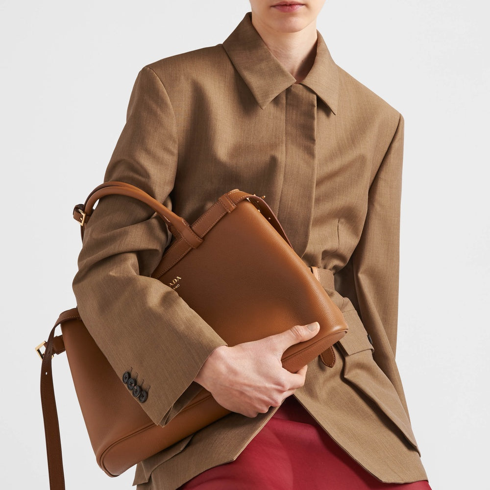 Prada Buckle medium leather handbag with double belt