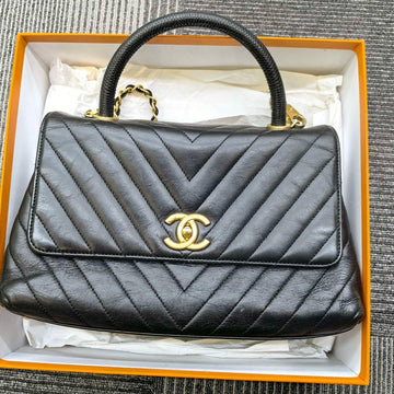 Chanel  Coco Top Handle Bag in Black Quilted Leather